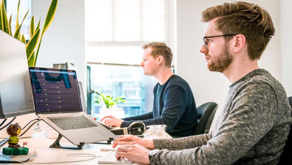 Two men working in the office