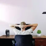 Man sitting comfortably in an adjustable office chair