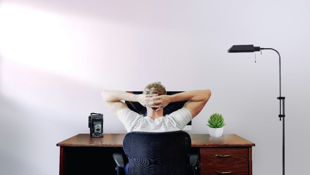 A man sitting in an office chair