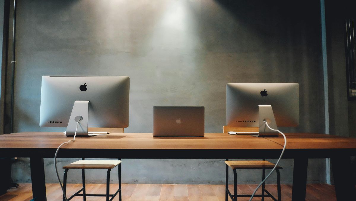 Office desk with computer desktop