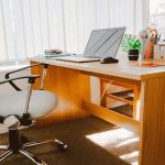 White ergonomic office chair and office table