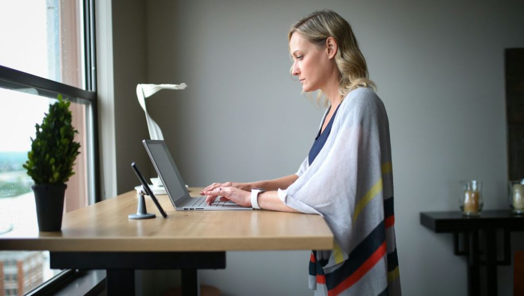 Girl working on a standing desk