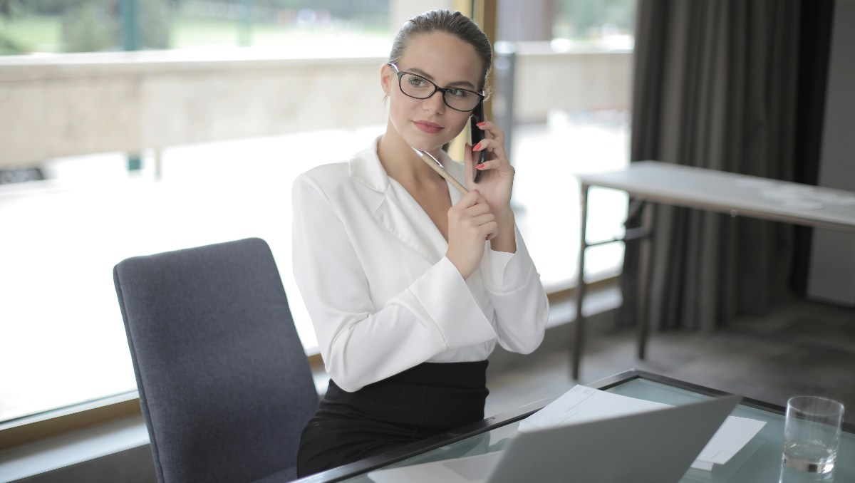 A woman business owner sitting on office chair