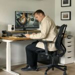 Man sitting in office chair in the home office