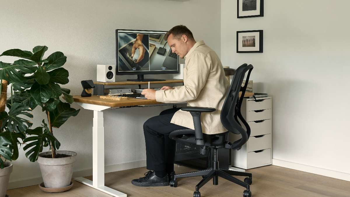 Man sitting in office chair in the home office