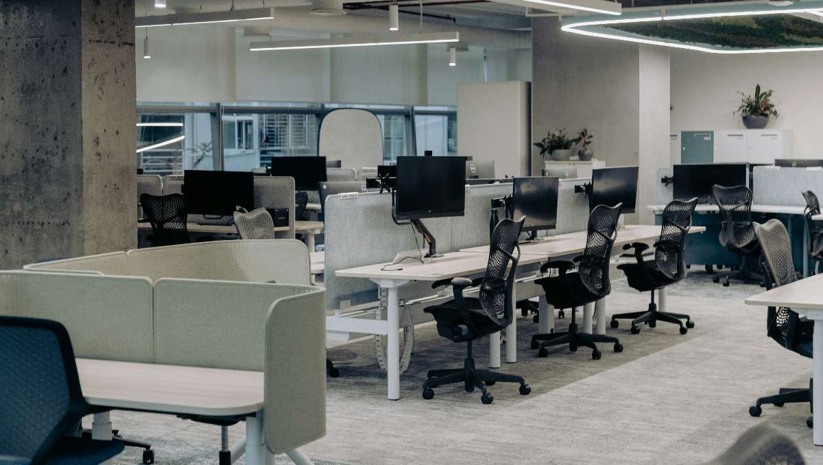 Office with office furniture chairs and desks