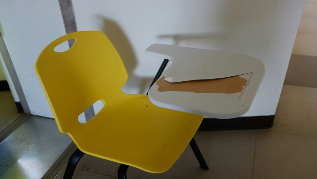 broken yellow office chair 