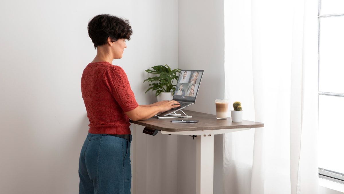 Woman working at a standing desk