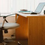 ergonomic desk made of hardwood and an office chair