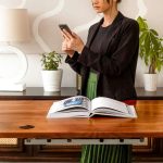Girl working on amish wood standing desk