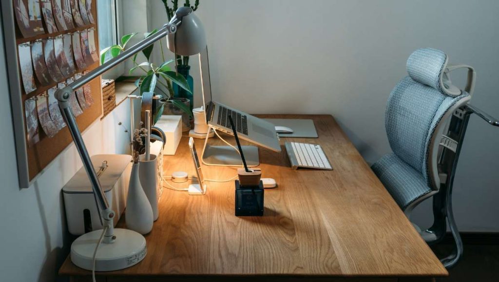 Bespoke wooden office table setup at home